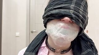 Tape tied to chair, ball gagged